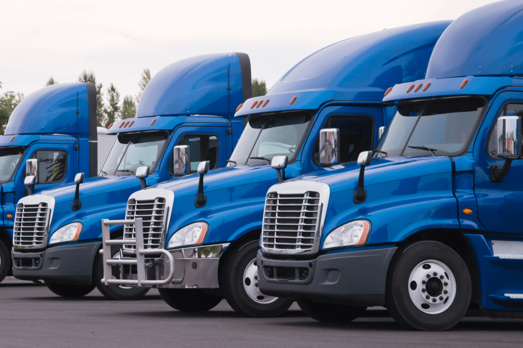 fleet of blue semi trucks