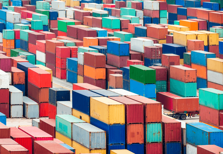 Stacked shipping containers.