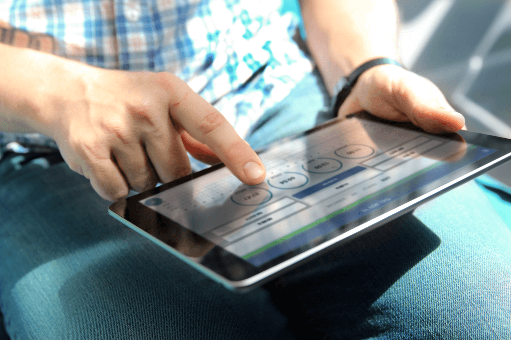 truck driver updating digital log book