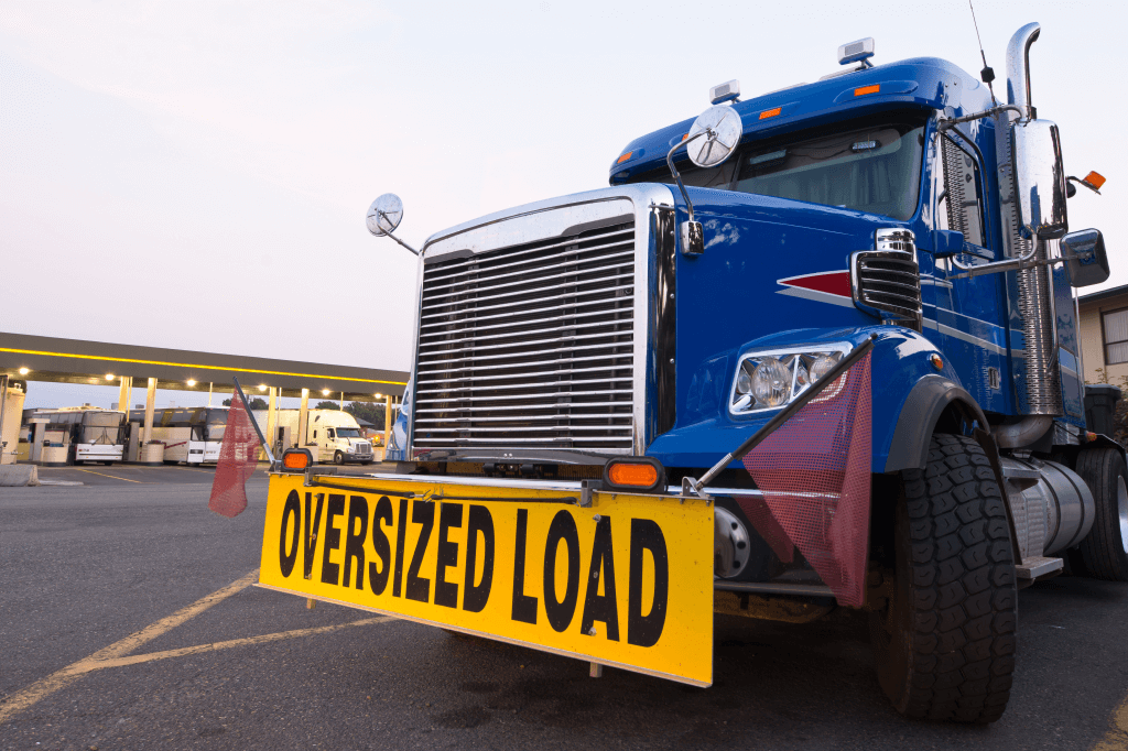 front of truck with oversized load sign