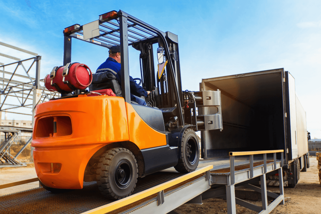 Trailer being loaded with a fork-lift.