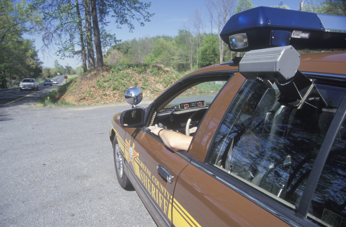 bear trap example image, parked police cruiser with radar gun
